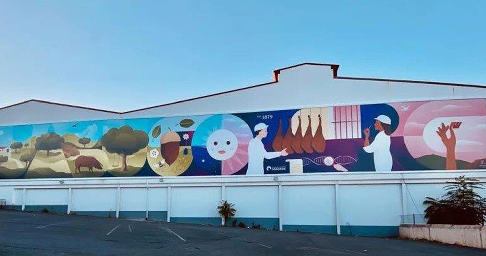El Mural de Sánchez Romero Carvajal dará la bienvenida a los viajeros a Jabugo El Mural de Sánchez Romero Carvajal dará la bienvenida a los viajeros a Jabugo